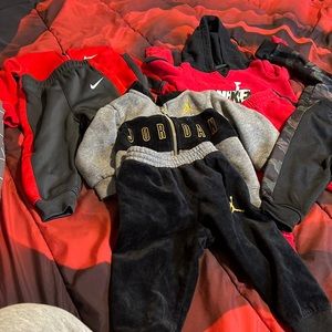 Five 12 month sets that are for a baby boy